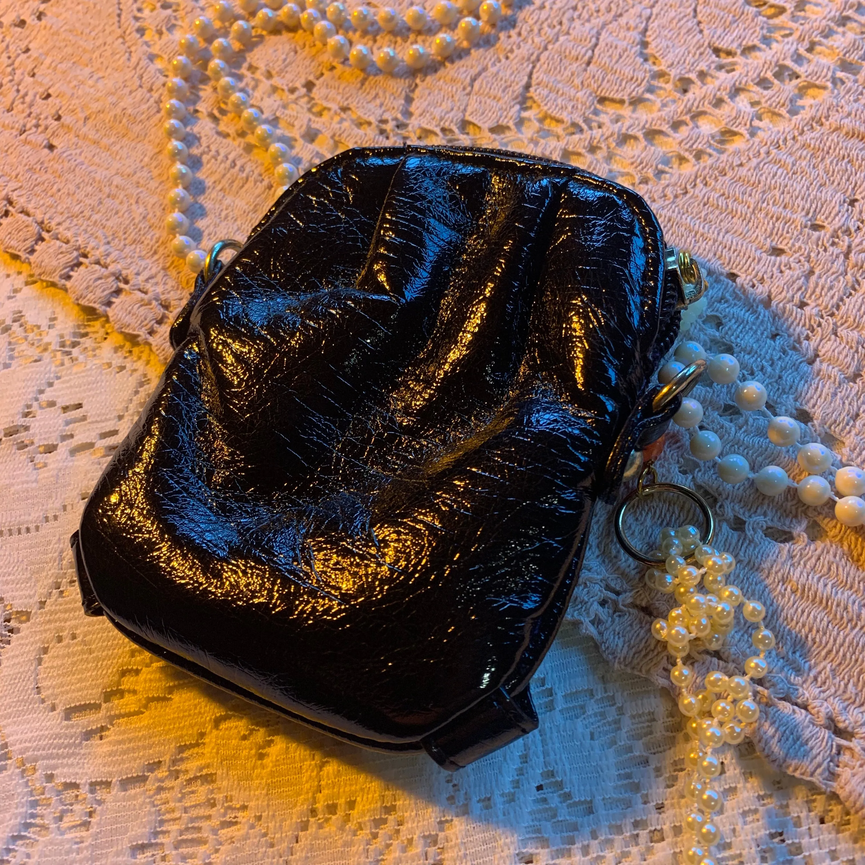 Patent pearl charm bag